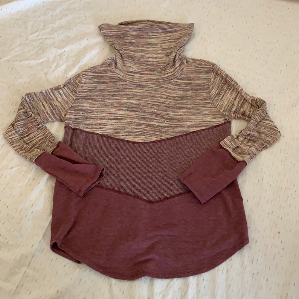 Mauve Maurice's turtleneck